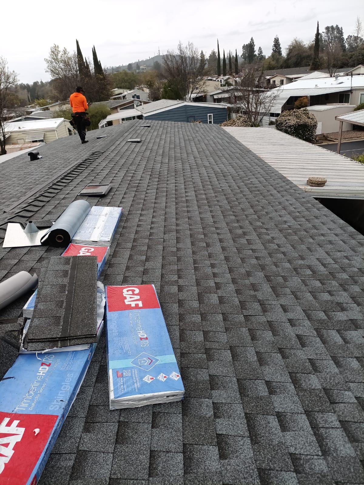 questions to ask a roofer. image of a new roof.