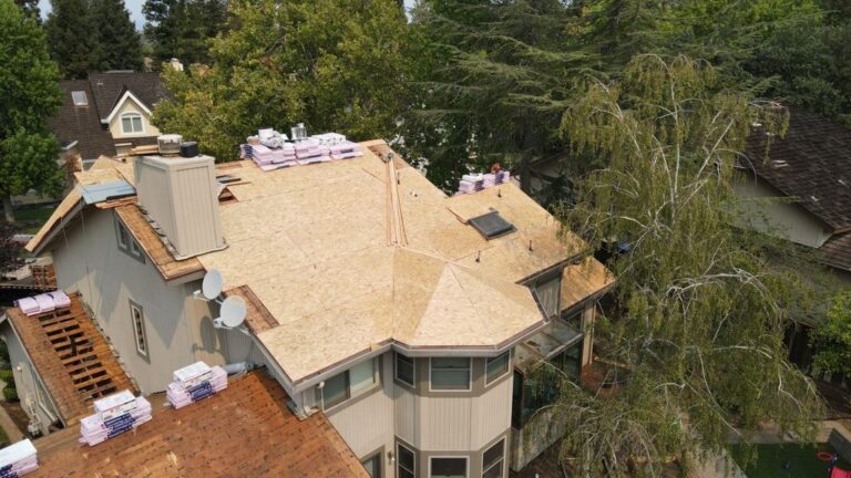 how to choose a roofing contractor. Image of a bare roof waiting for new materials to be laid.