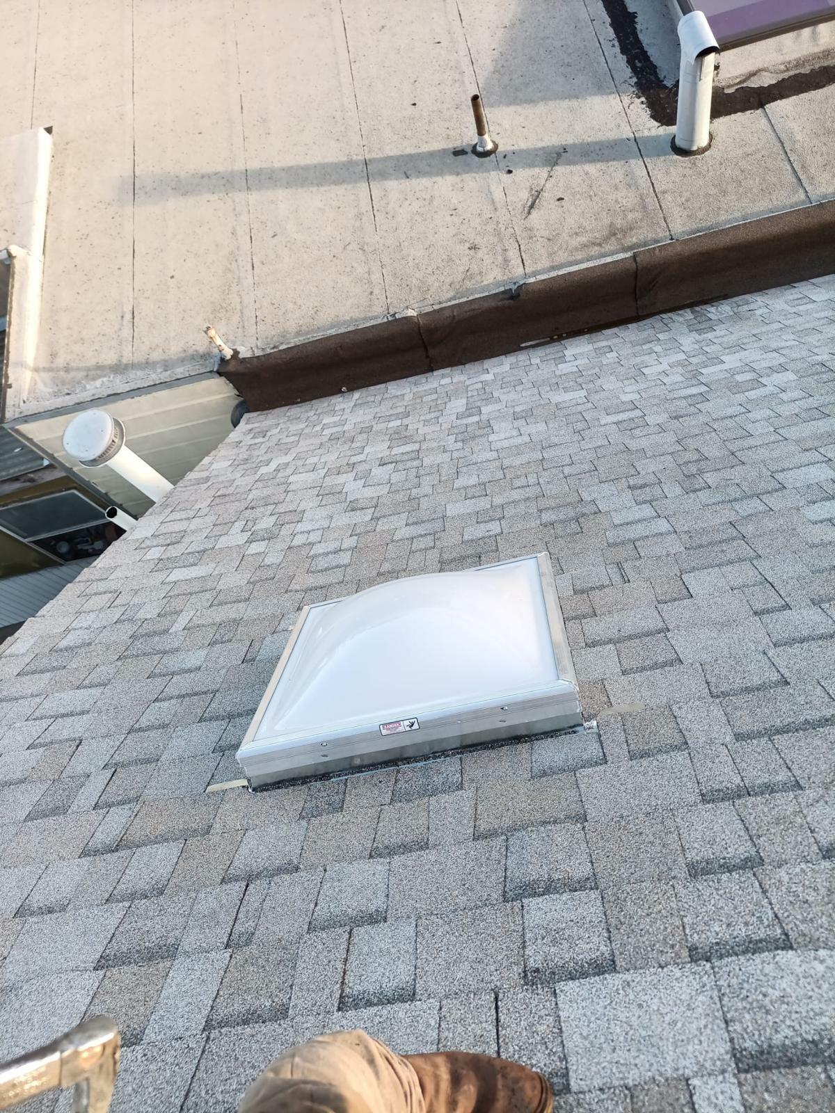 slate vs asphalt shingles. Image of roof shingles.